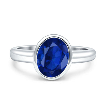Bezel Set 8mmX6mm Oval Engagement Ring Simulated Blue Sapphire CZ 925 Sterling Silver Wholesale